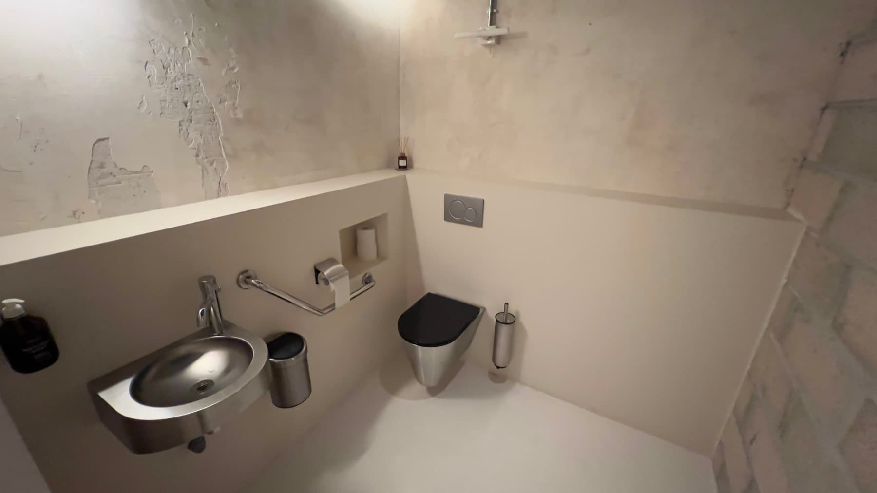 Designer washroom with double basin and mirror — Chez Les Plombiers, Paris 1st